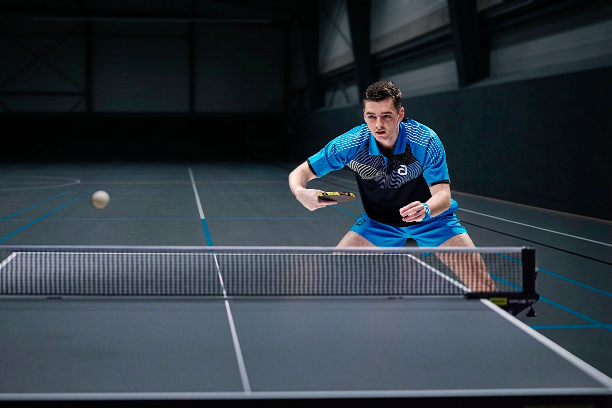 andro-Shirt-Avos-schwarz-blau-01-Action-300-021-259-72dpi